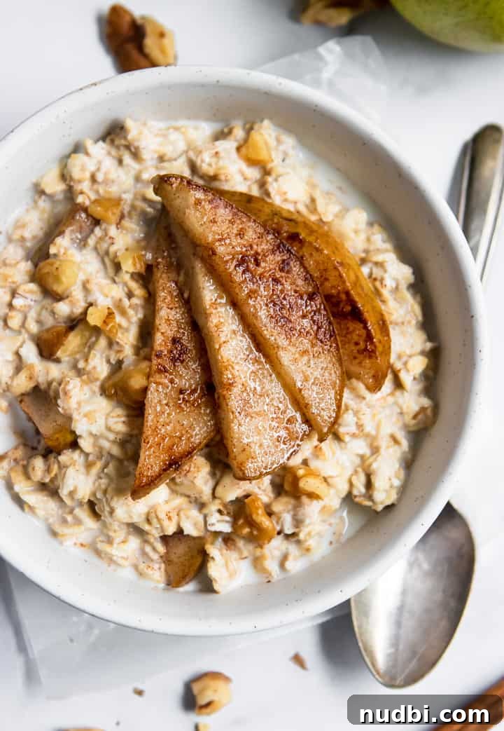 Spiced Pear & Walnut Overnight Oats for Cozy Mornings 2 Spiced Pear Oatmeal in bowl.