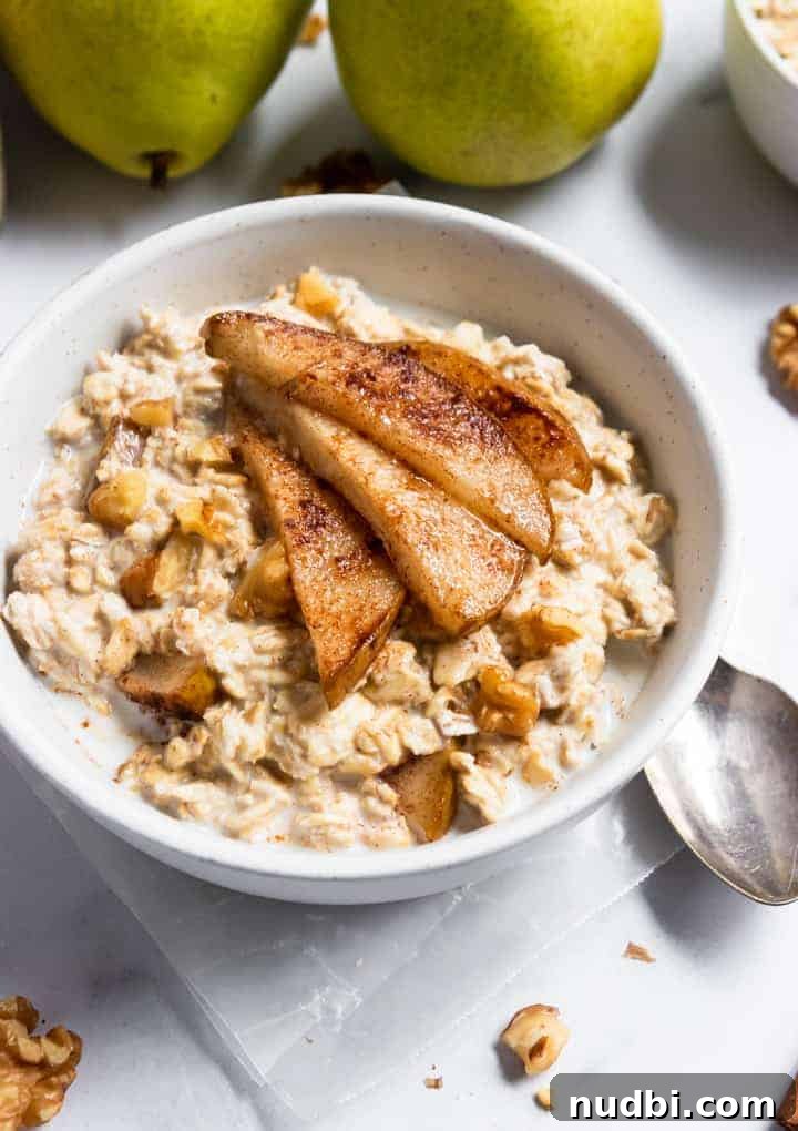 Spiced Pear & Walnut Overnight Oats for Cozy Mornings 3 Spiced pear oatmeal with walnuts.