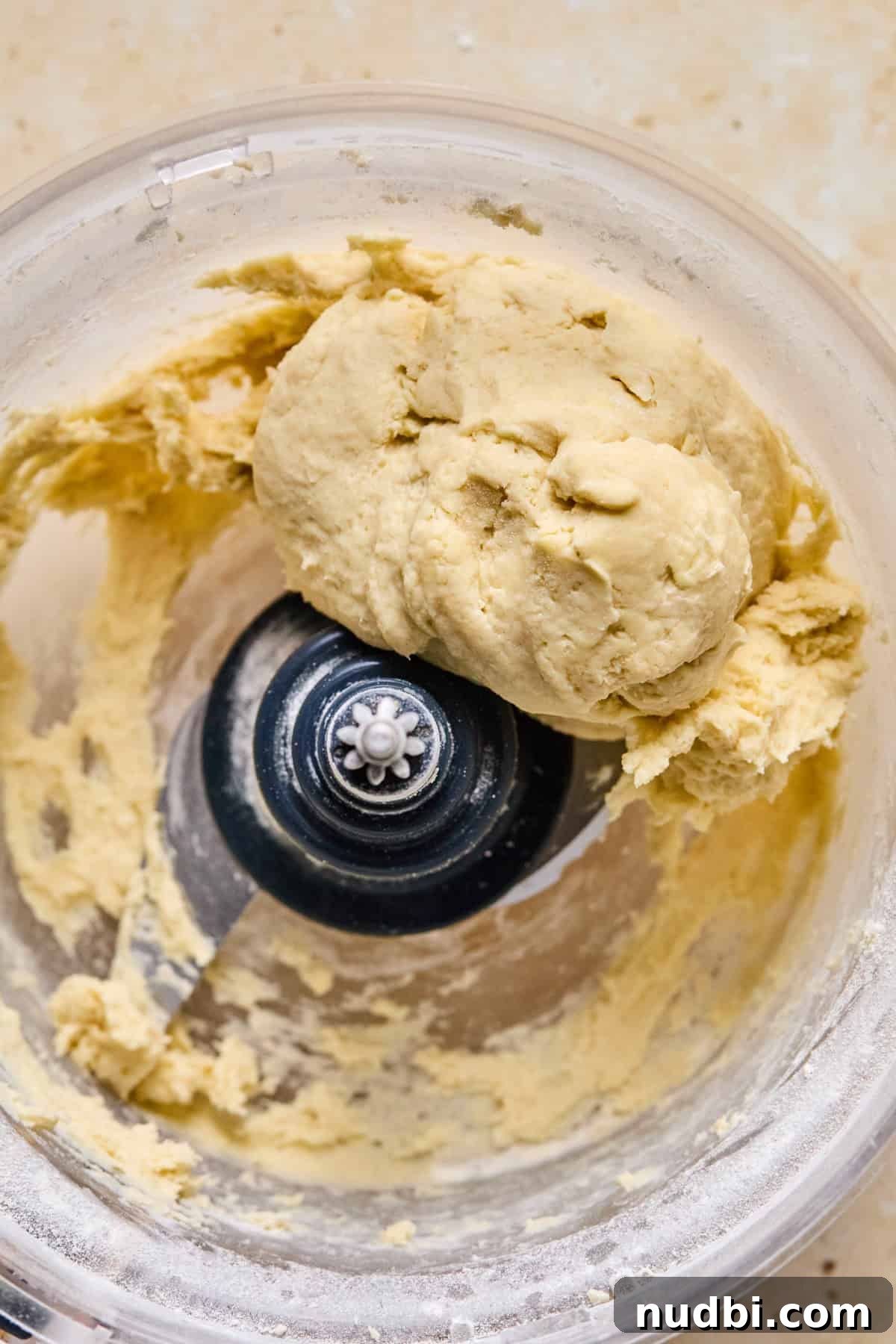 Air Fryer Blueberry Hand Pies Recipe 7 Ball of pie crust in food processor.