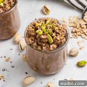 Chocolate Pistachio Overnight Oats Recipe for Creamy Make-Ahead Breakfast 4 Pistachio oatmeal with chocolate in jar.