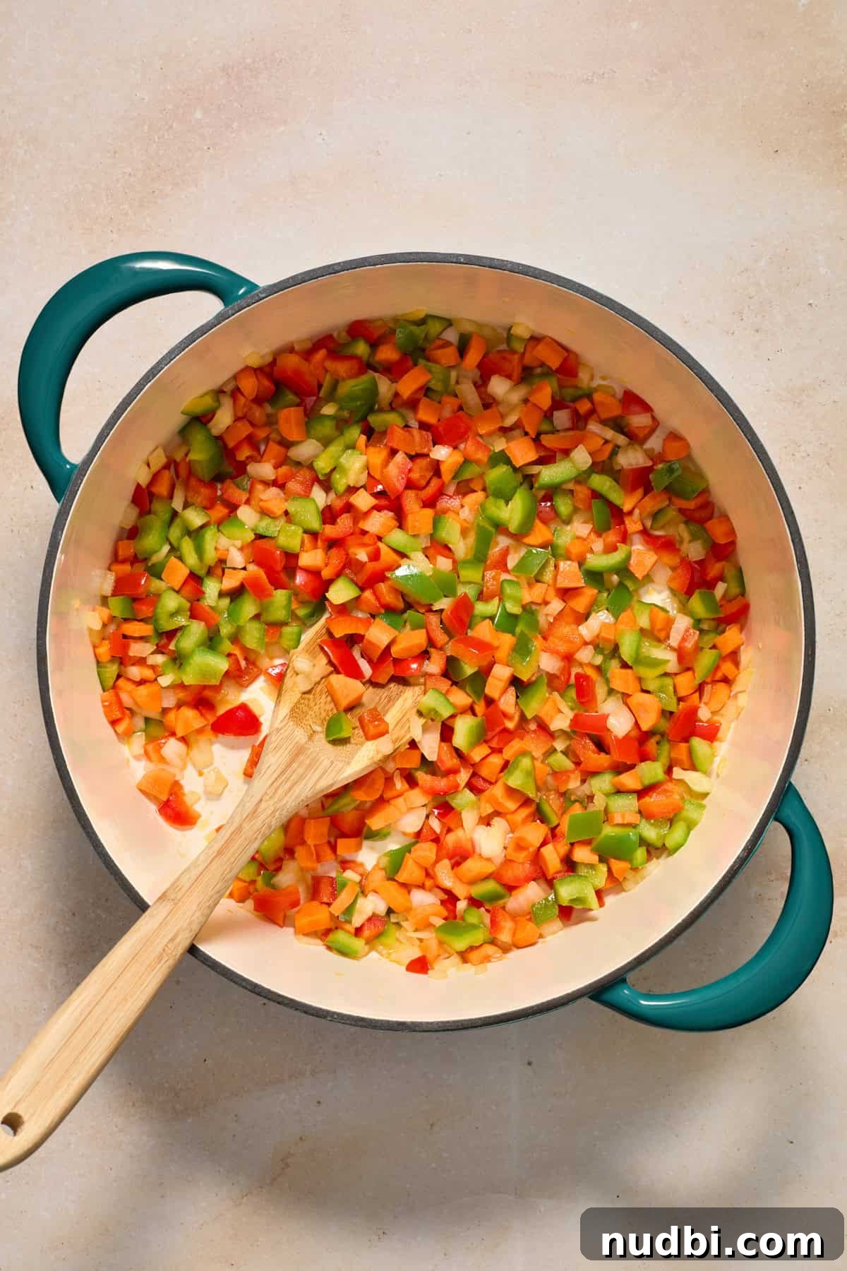 Savory Ground Turkey Spaghetti Sauce Recipe 5 Onions, carrots, and peppers in dutch oven.