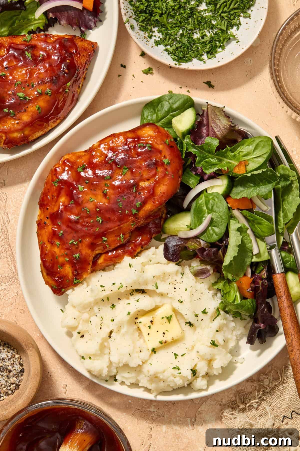 Juicy BBQ Chicken Breast in the Air Fryer — Quick Recipe 2 Air fryer bbq chicken breast served on plate with mashed potatoes and green salad.