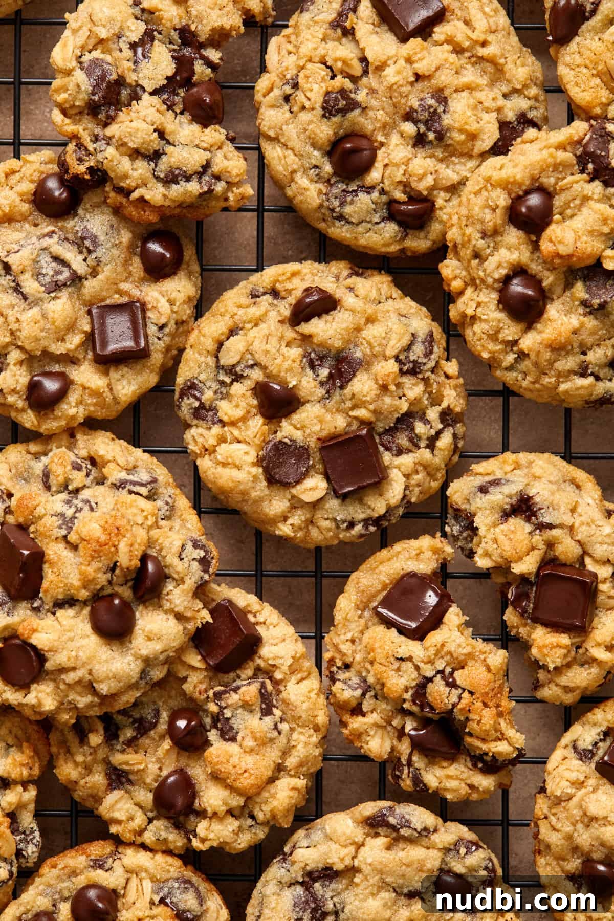 Gluten-Free Almond Flour Oatmeal Chocolate Chip Cookies 2 Wire rack with almond flour oatmeal chocolate chip cookies arranged on in an even layer.