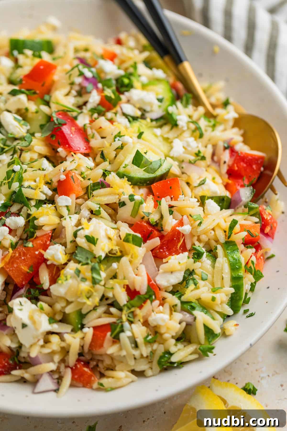 Lemon Orzo Salad with Feta, Herbs & Olive Oil Dressing 3 Lemon orzo salad with feta in bowl.