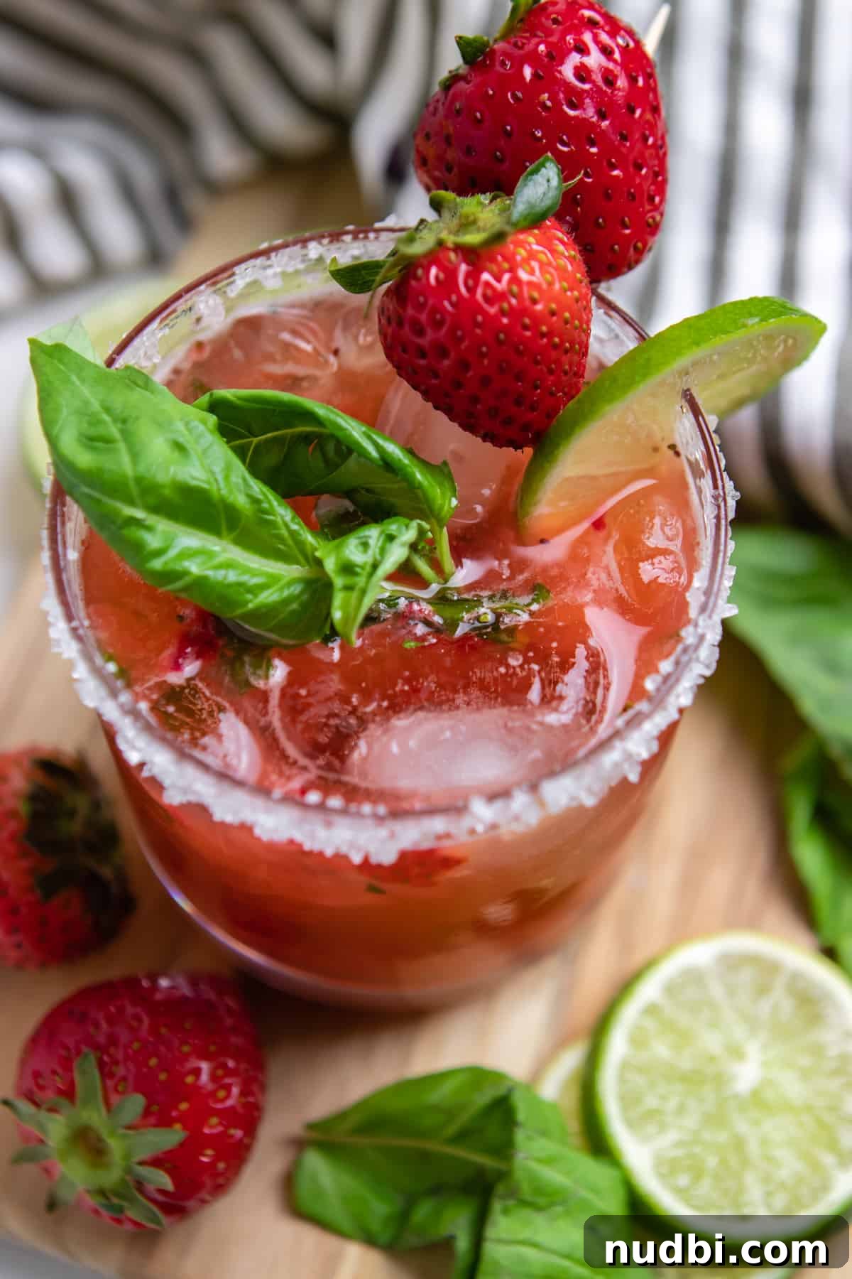 Strawberry Basil Margarita Recipe: Fresh, Tangy Cocktail Guide 2 Strawberry basil margarita cocktail with lime and berry garnish.