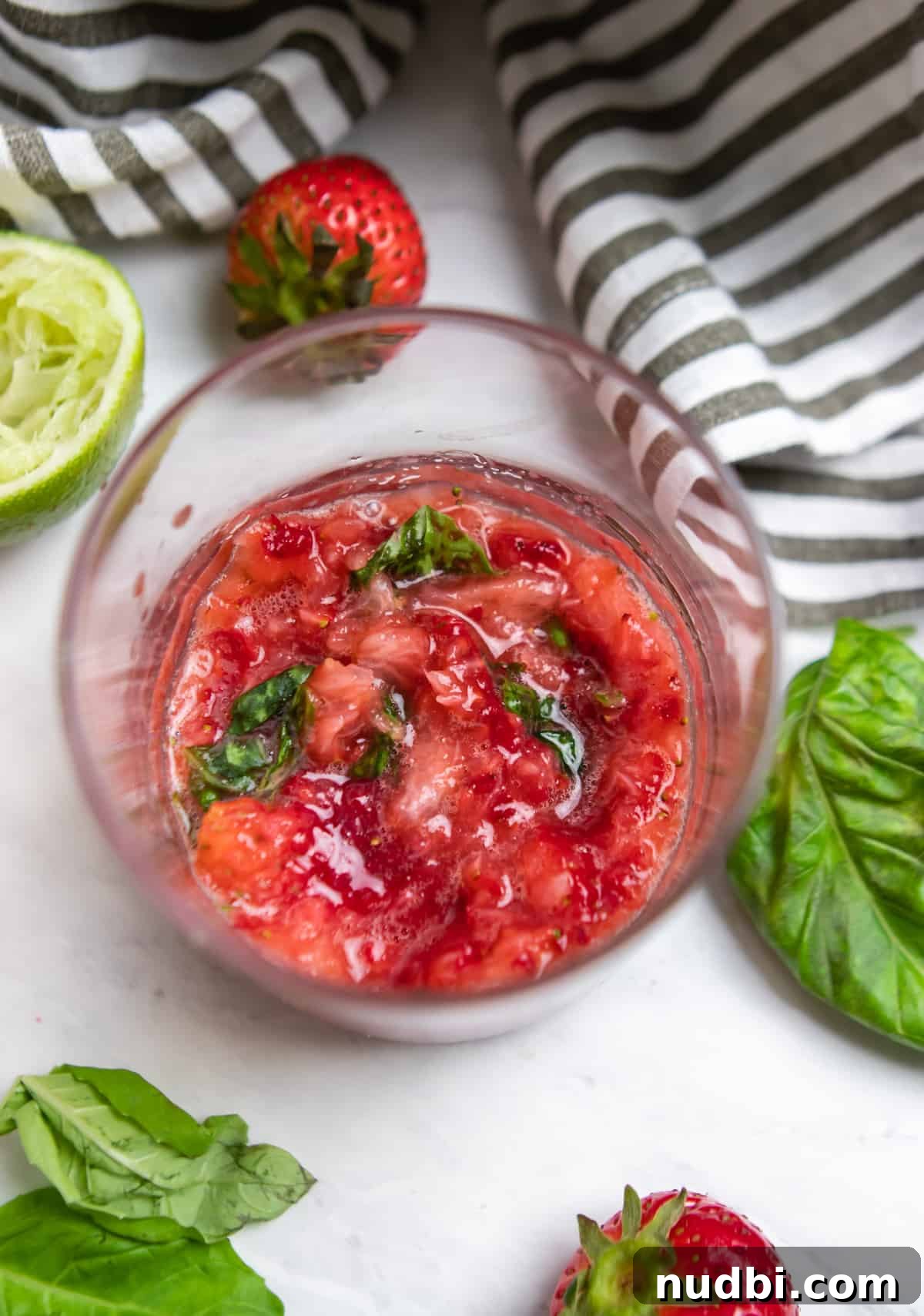 Strawberry Basil Margarita Recipe: Fresh, Tangy Cocktail Guide 5 Muddled strawberries and basil.