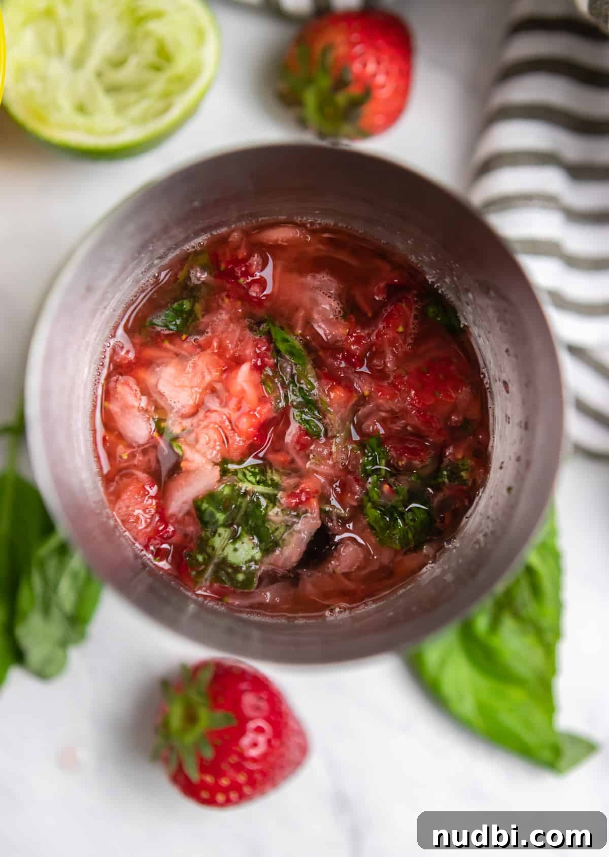 Strawberry Basil Margarita Recipe: Fresh, Tangy Cocktail Guide 6 Strawberry basil margarita ingredients in cocktail mixer.