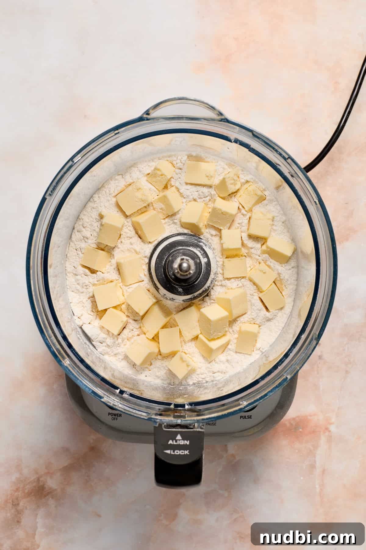 Strawberry and Peach Shortcake Recipe | Summer Dessert Guide 5 Cubed butter in food processor with flour mixture.