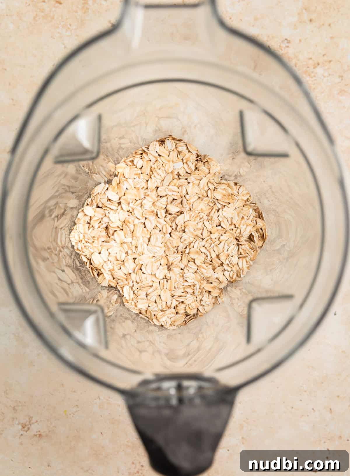 Apple Cinnamon Oatmeal Pancakes Recipe: Fluffy, Whole-Grain Breakfast 4 Rolled oats in blender before being processed into oat flour.