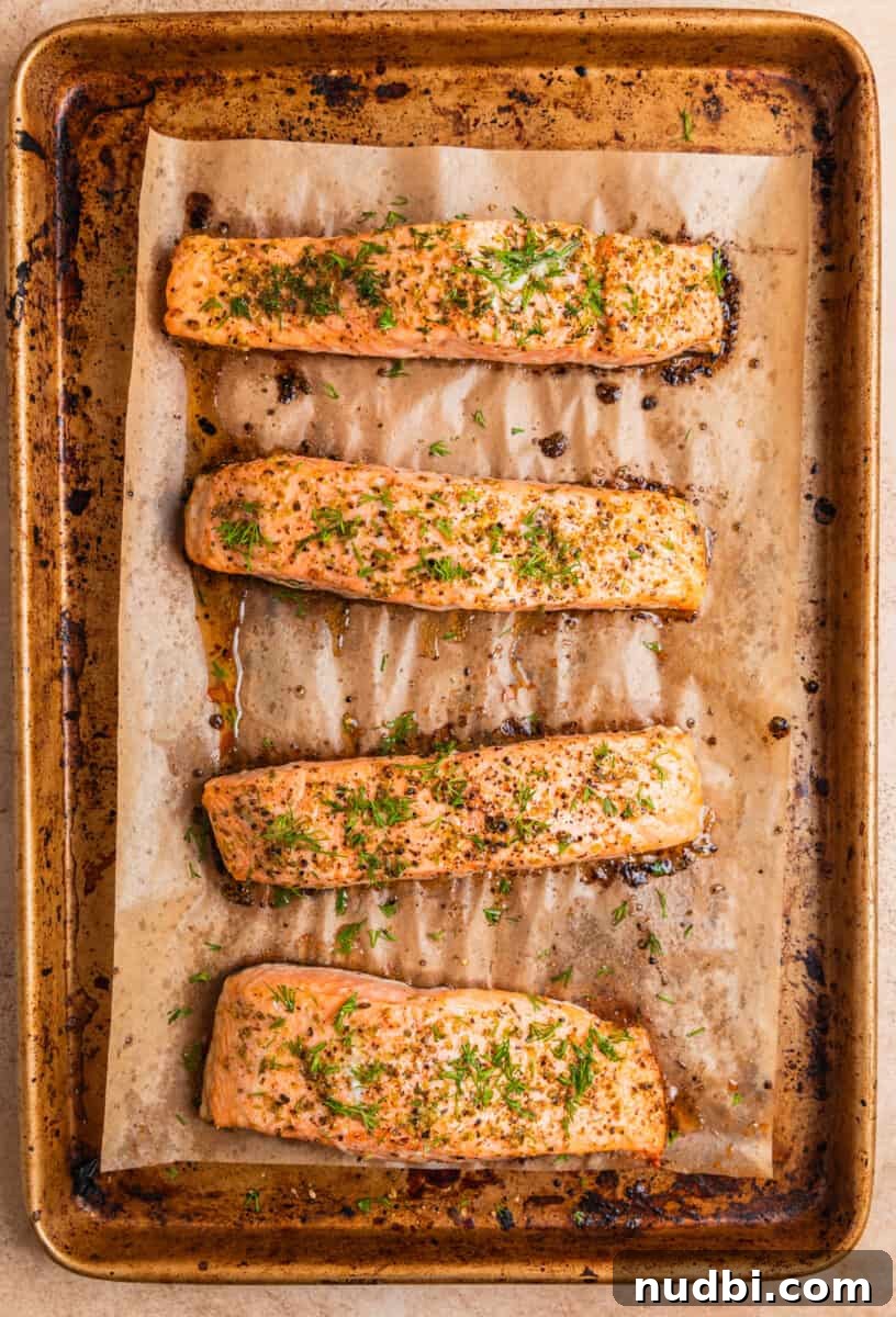 Greek Salmon Rice Bowls with Tzatziki & Lemon Dill Rice 5 Baked Greek salmon on sheet pan.