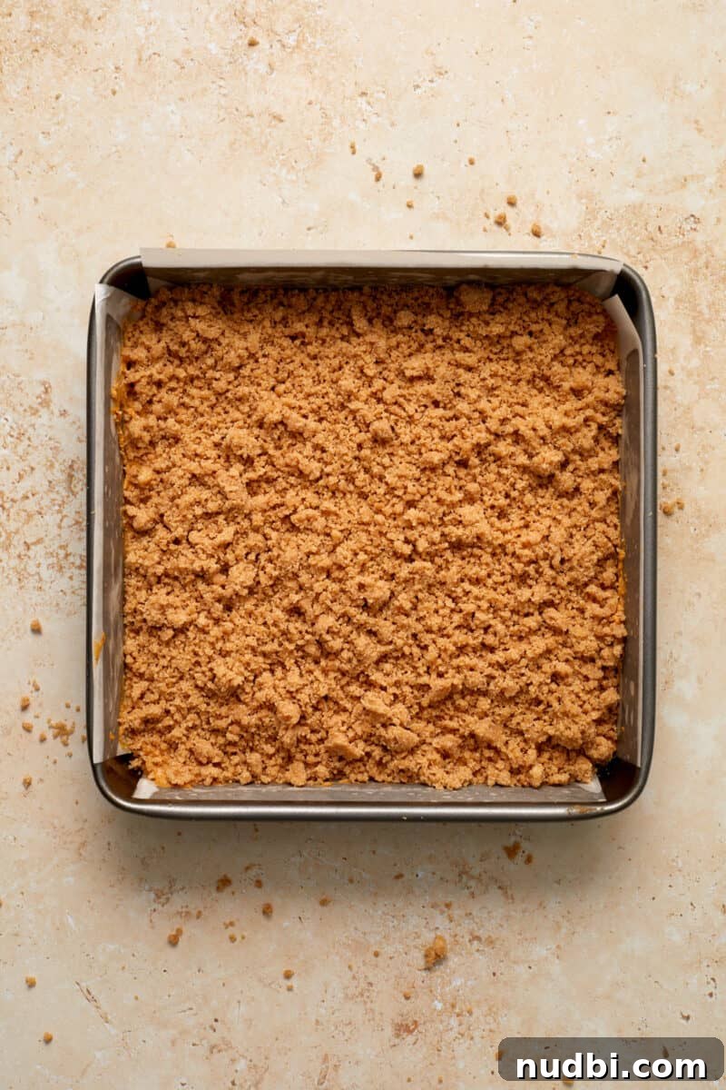 Cinnamon Streusel Pumpkin Coffee Cake Recipe for Fall Baking 14 Pumpkin coffee cake in baking pan ready for oven.