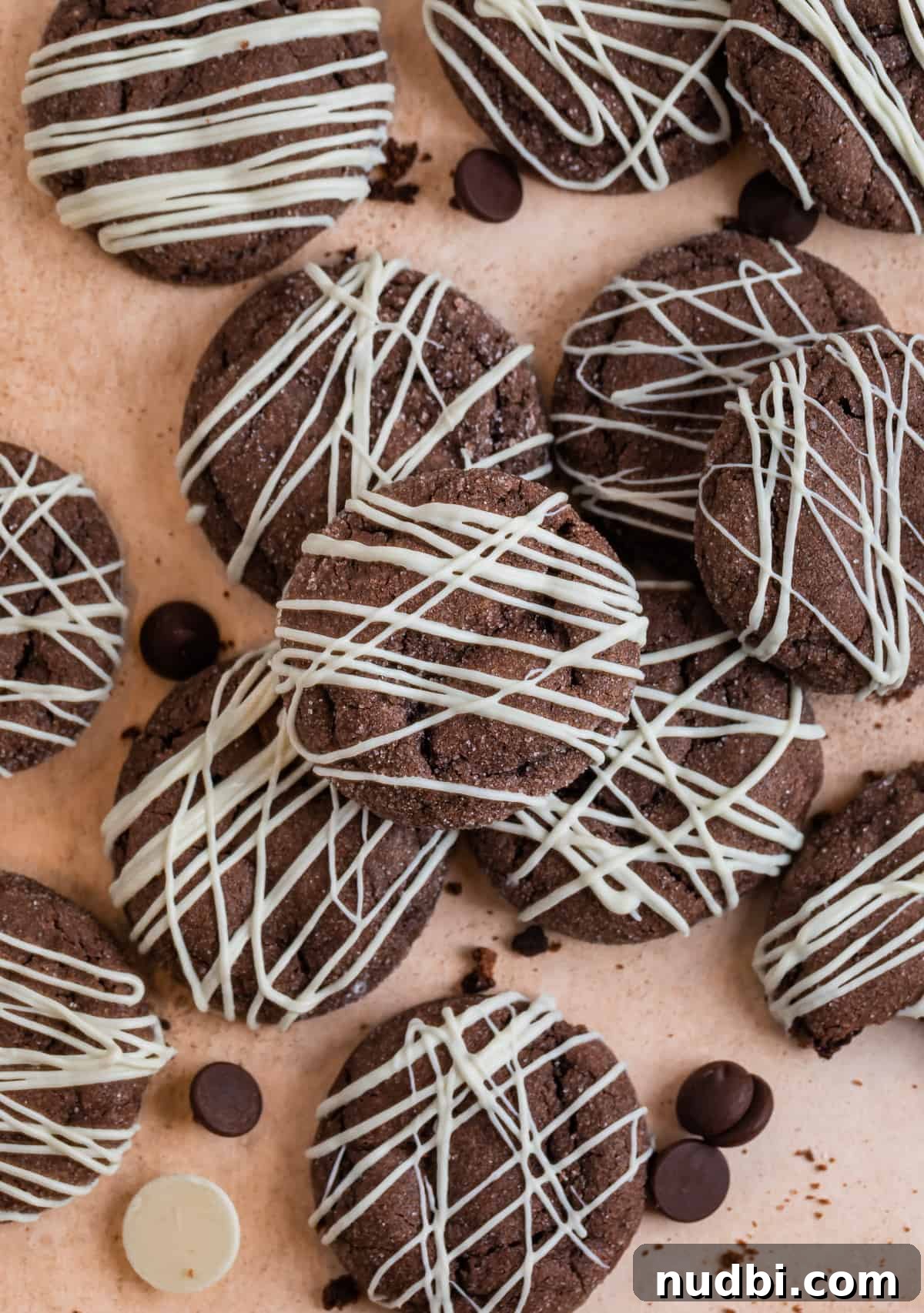 Chewy Chocolate Cake Mix Cookies Recipe for Perfect Cocoa Treats 12 White chocolate drizzled cake mix cookies arranged on counter.