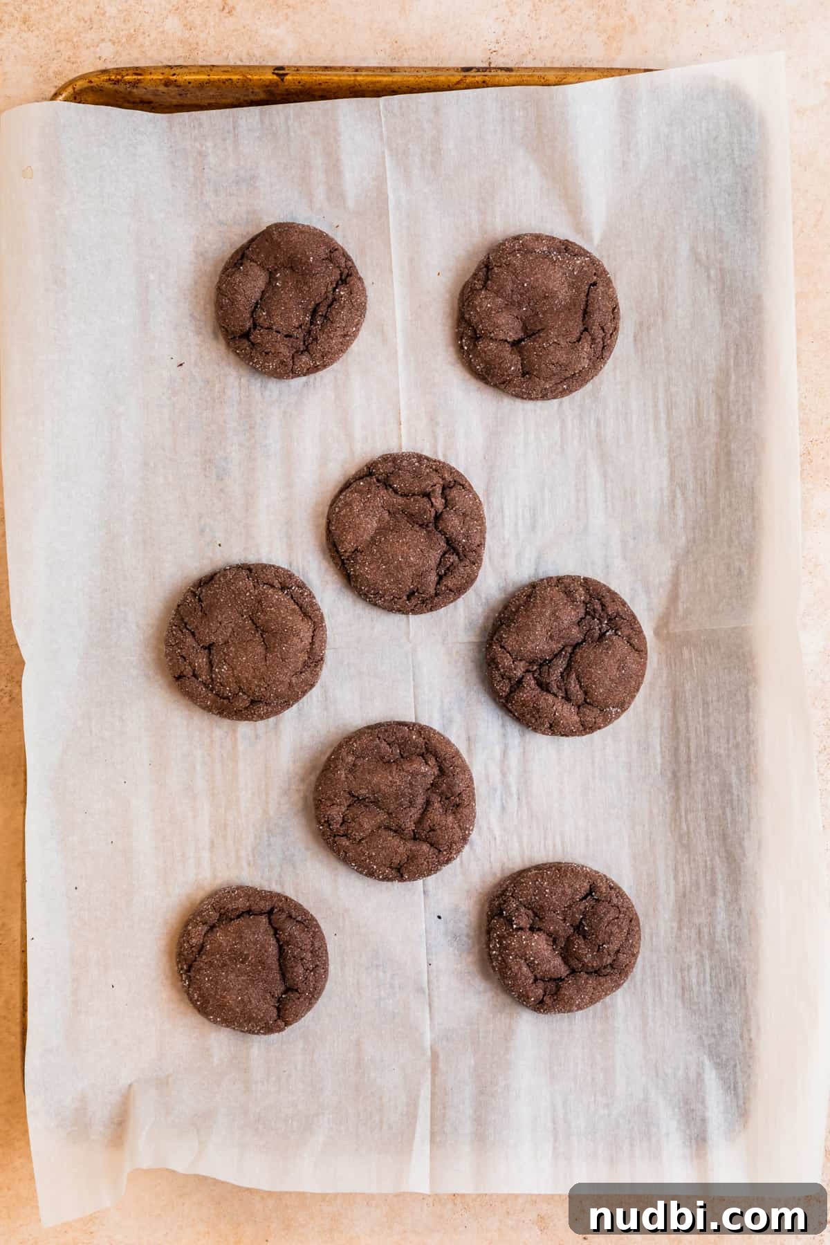 Chewy Chocolate Cake Mix Cookies Recipe for Perfect Cocoa Treats 7 Baked chocolate cake mix cookies on parchment lined cookie sheet.