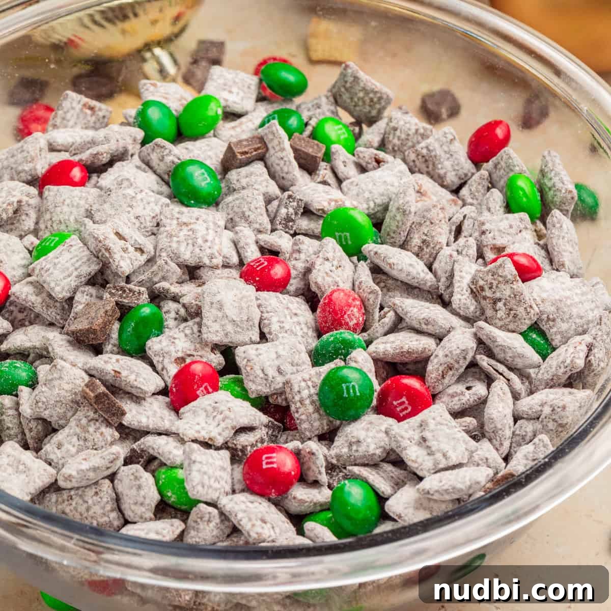 Bowl with holiday mint chocolate puppy chow.