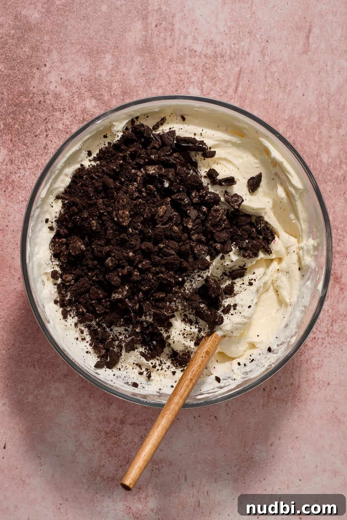 No‑Bake Peppermint Oreo Cheesecake Recipe for the Holidays 14 Crushed Oreos added to no bake cheesecake mixture.