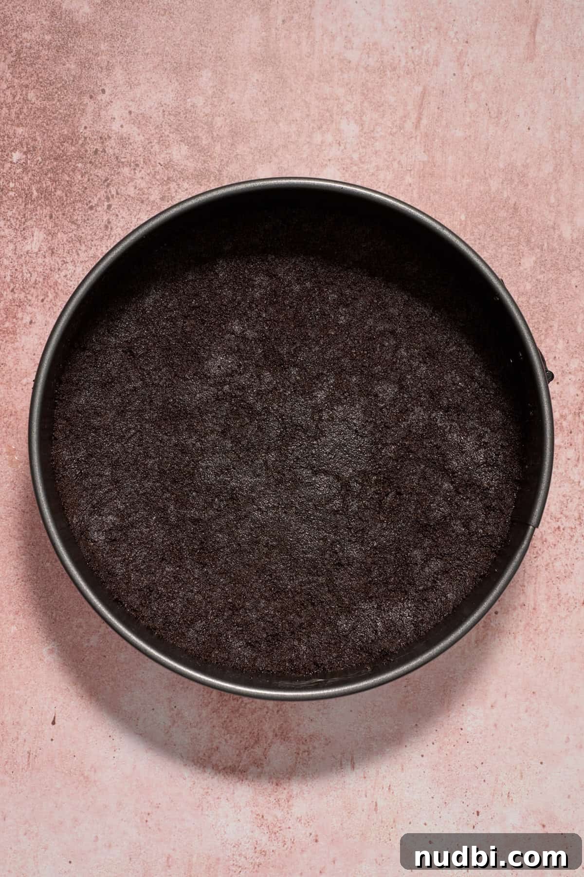 No‑Bake Peppermint Oreo Cheesecake Recipe for the Holidays 8 Sprinform pie pan with Oreo crust.