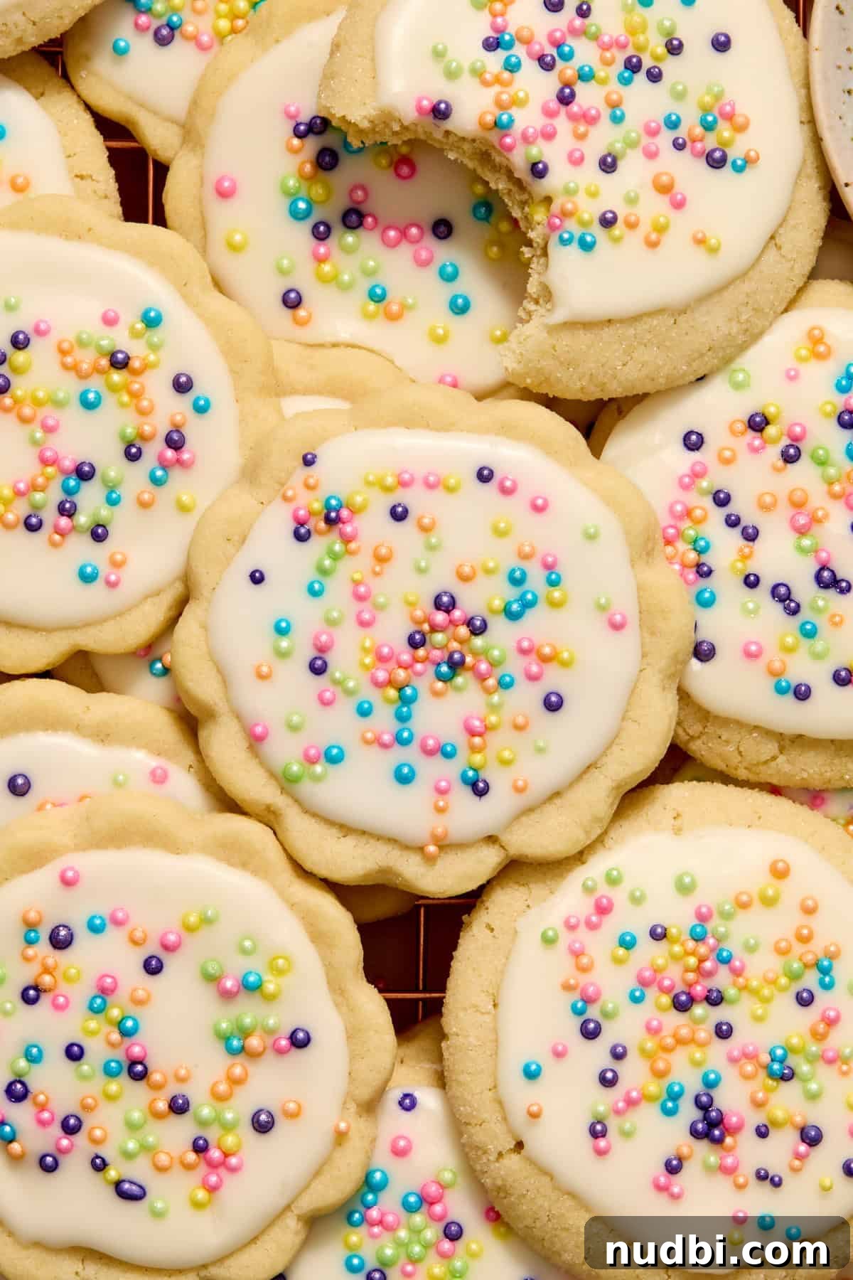 Soft and Chewy Eggless Sugar Cookies Recipe 11 Eggless sugar cookies arranged together with cut outs and drop cookie variations.