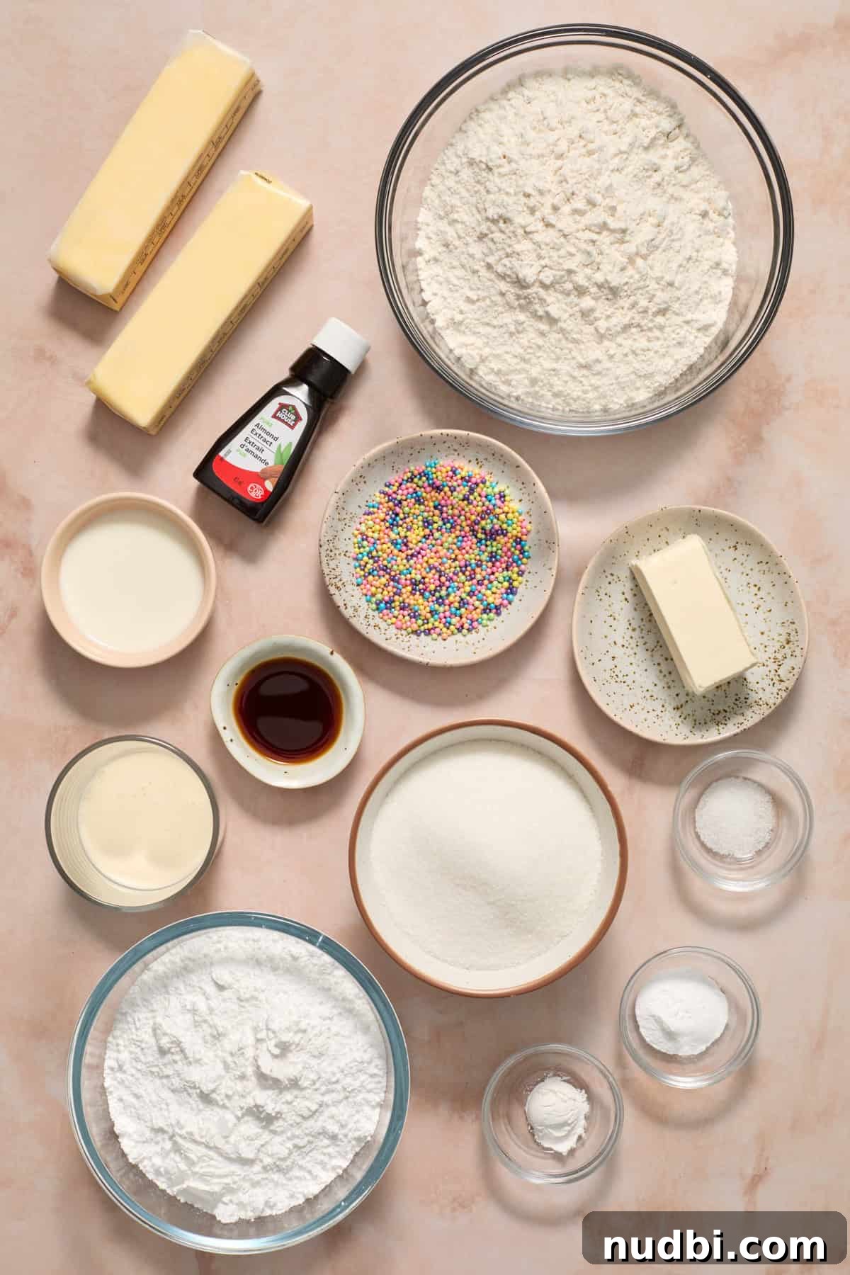 Soft and Chewy Eggless Sugar Cookies Recipe 3 Butter, flour, sugar and other ingredients on surface.
