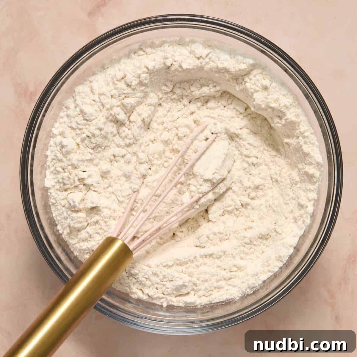 Soft and Chewy Eggless Sugar Cookies Recipe 6 Dry ingredients whisked together in bowl.