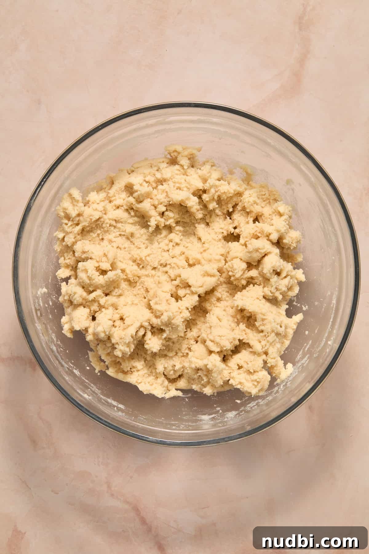 Soft and Chewy Eggless Sugar Cookies Recipe 7 Flour and dry ingredients mixed into wet ingredients for sugar cookie recipe.