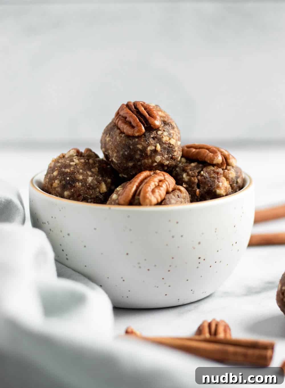 Pecan Pie Energy Bites: No-Bake Snack for Lasting Energy 4 Bowl of no bake energy bites.