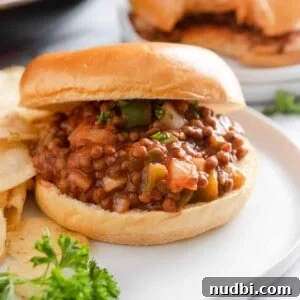 30-Minute Dinner Recipes You'll Love 23 Vegan sloppy Joes on bun with chips.
