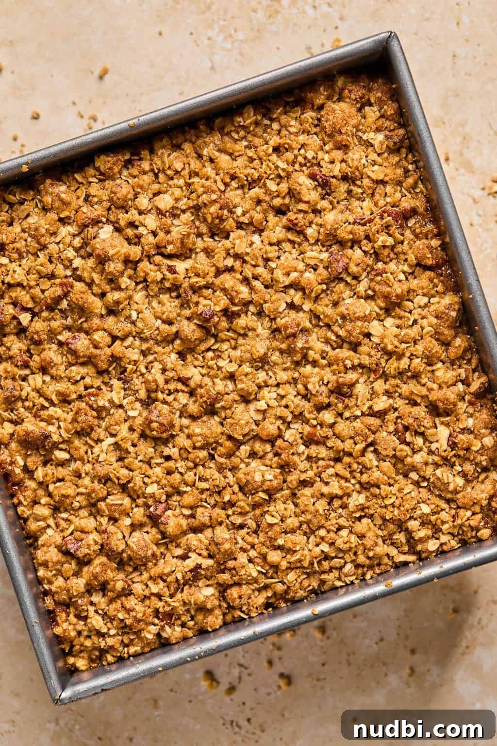 Ultimate Pumpkin Pie Crumble Recipe with a Buttery Streusel Topping 10 Baked pumpkin pie crumble in pan fresh from the oven.