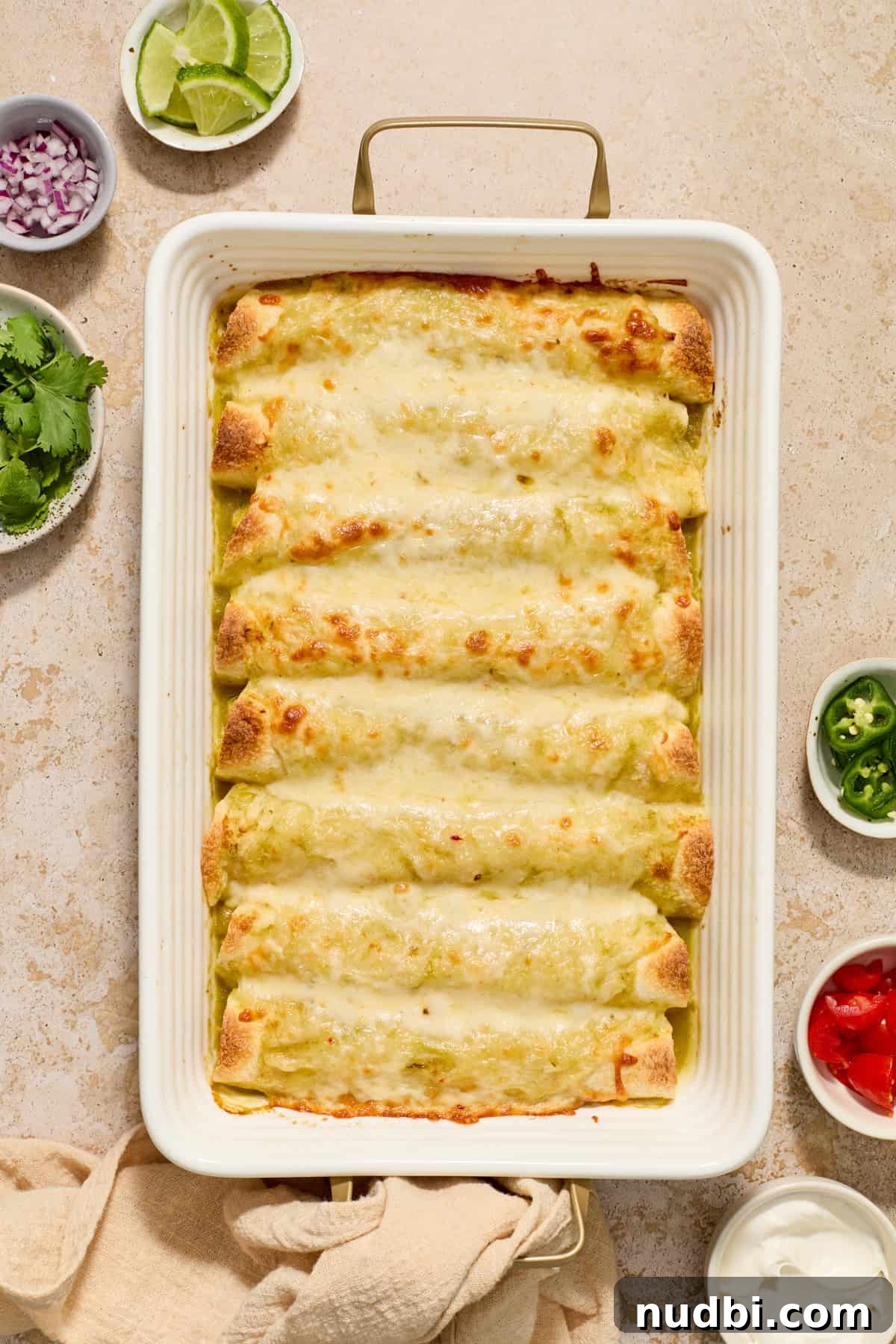 Authentic Green Salsa Chicken Enchiladas Recipe 10 Baked green chicken enchiladas fresh from the oven.