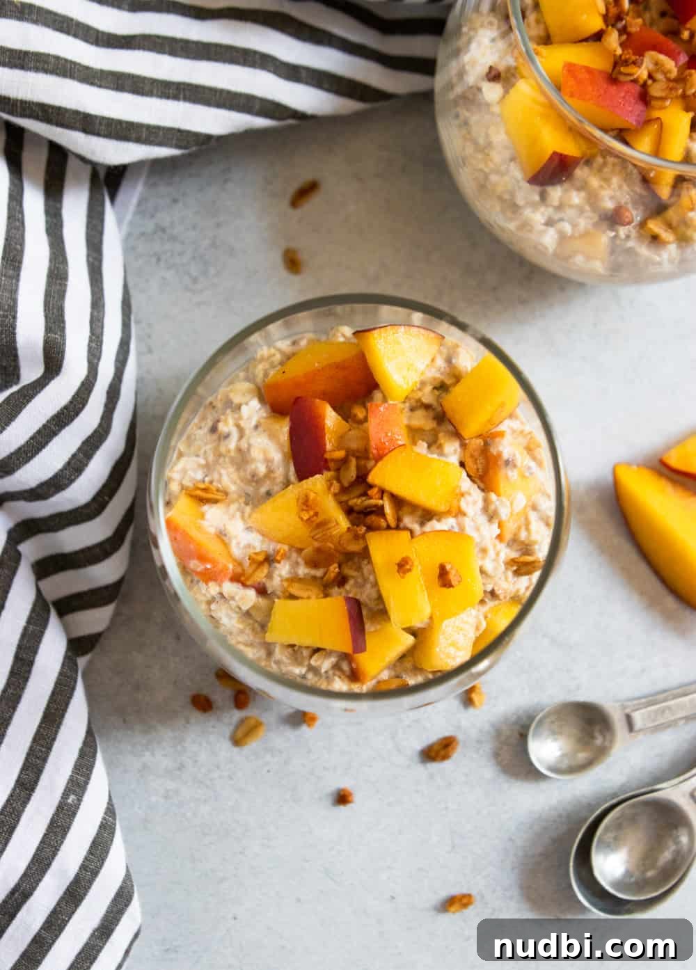 Peach Pie Overnight Oats Recipe for Quick Morning Meals 4 Overhead shot of glass of oats.