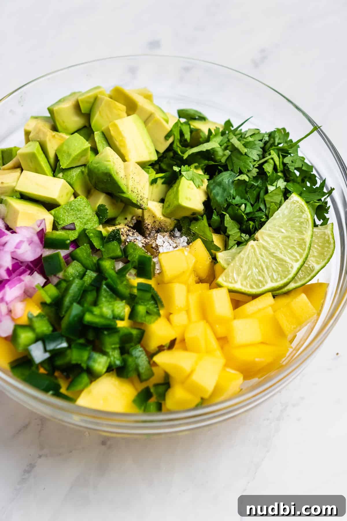 Mango and Avocado Salsa Recipe — Fresh Tropical Dip Guide 4 Salsa ingredients in glass mixing bowl.