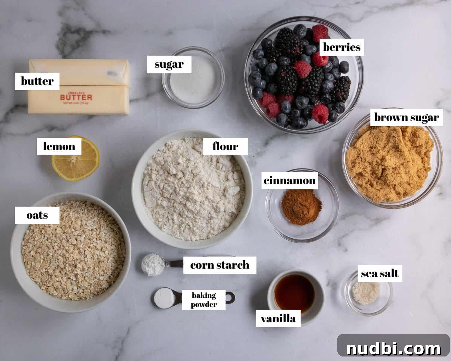 Mixed Berry Crumble Bars Recipe with Oat Streusel Topping 4 Ingredients labeled on white counter top.