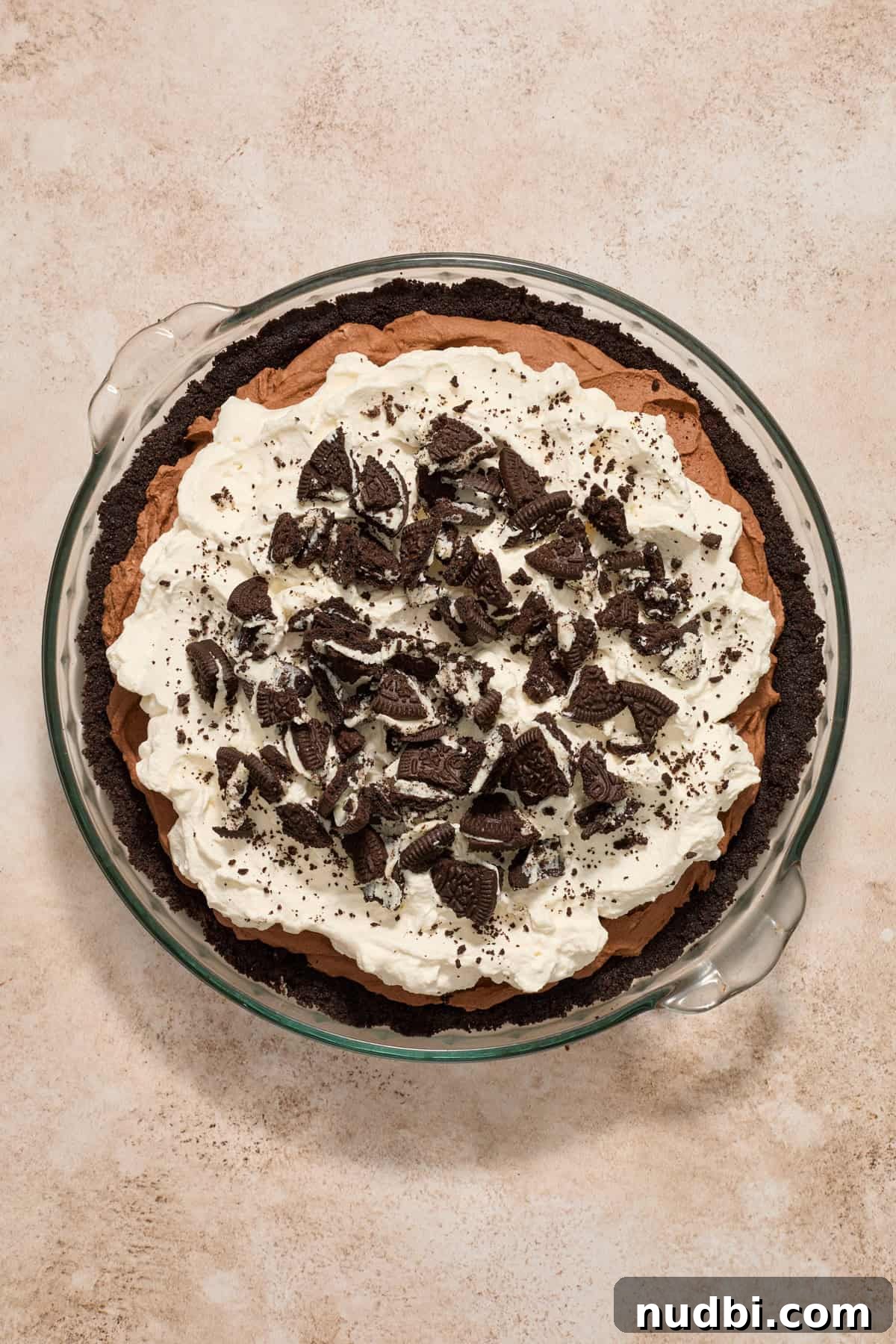 No-Bake Chocolate Cream Pie Recipe for Rich, No-Fuss Dessert 13 Whipped cream and crushed Oreos on top of no bake chocolate pie.