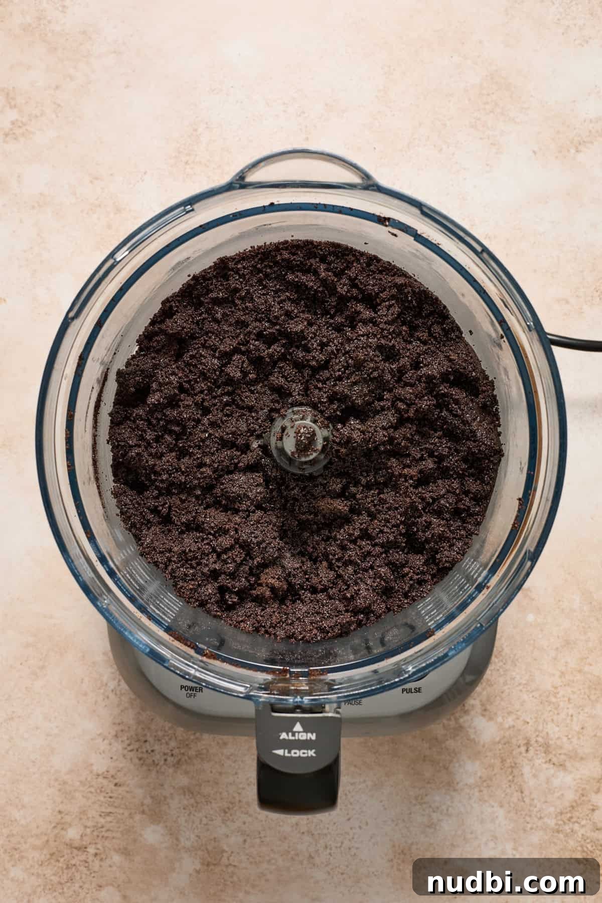 No-Bake Chocolate Cream Pie Recipe for Rich, No-Fuss Dessert 7 Chocolate Oreo pie crust mixture in food processor.