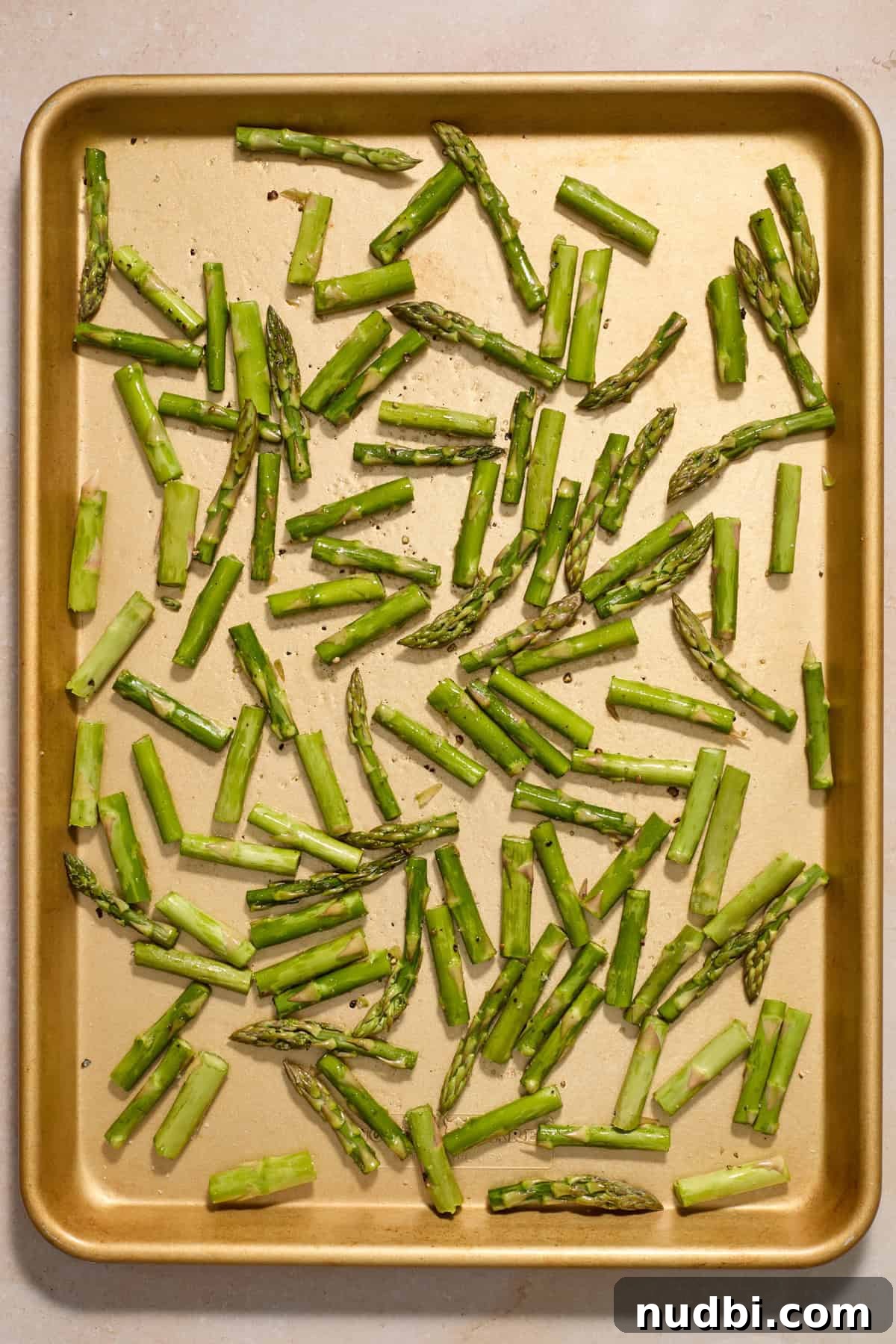 Creamy Spring Risotto with Peas and Asparagus 4 Chopped asparagus on sheet pan before roasting.