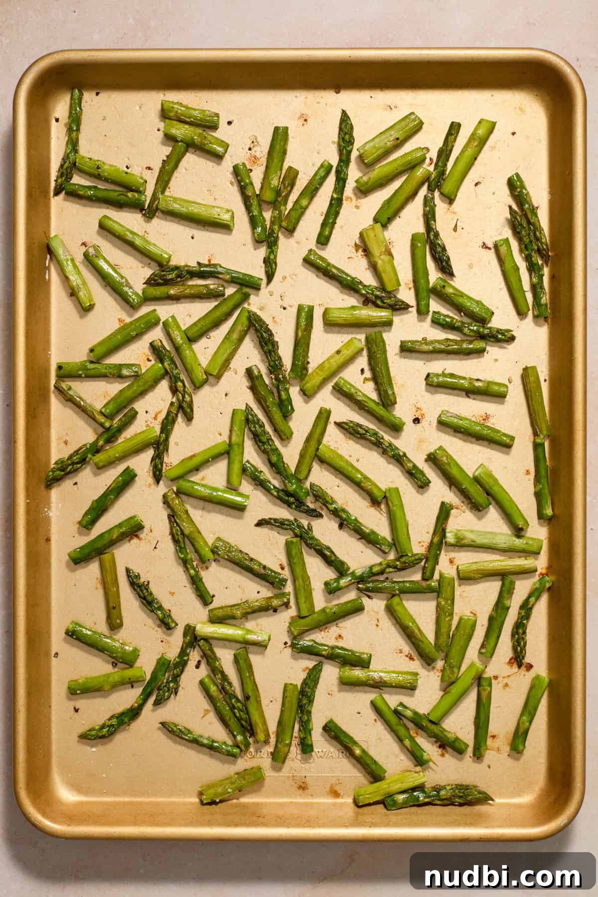 Creamy Spring Risotto with Peas and Asparagus 5 Roasted asparagus on sheet pan.