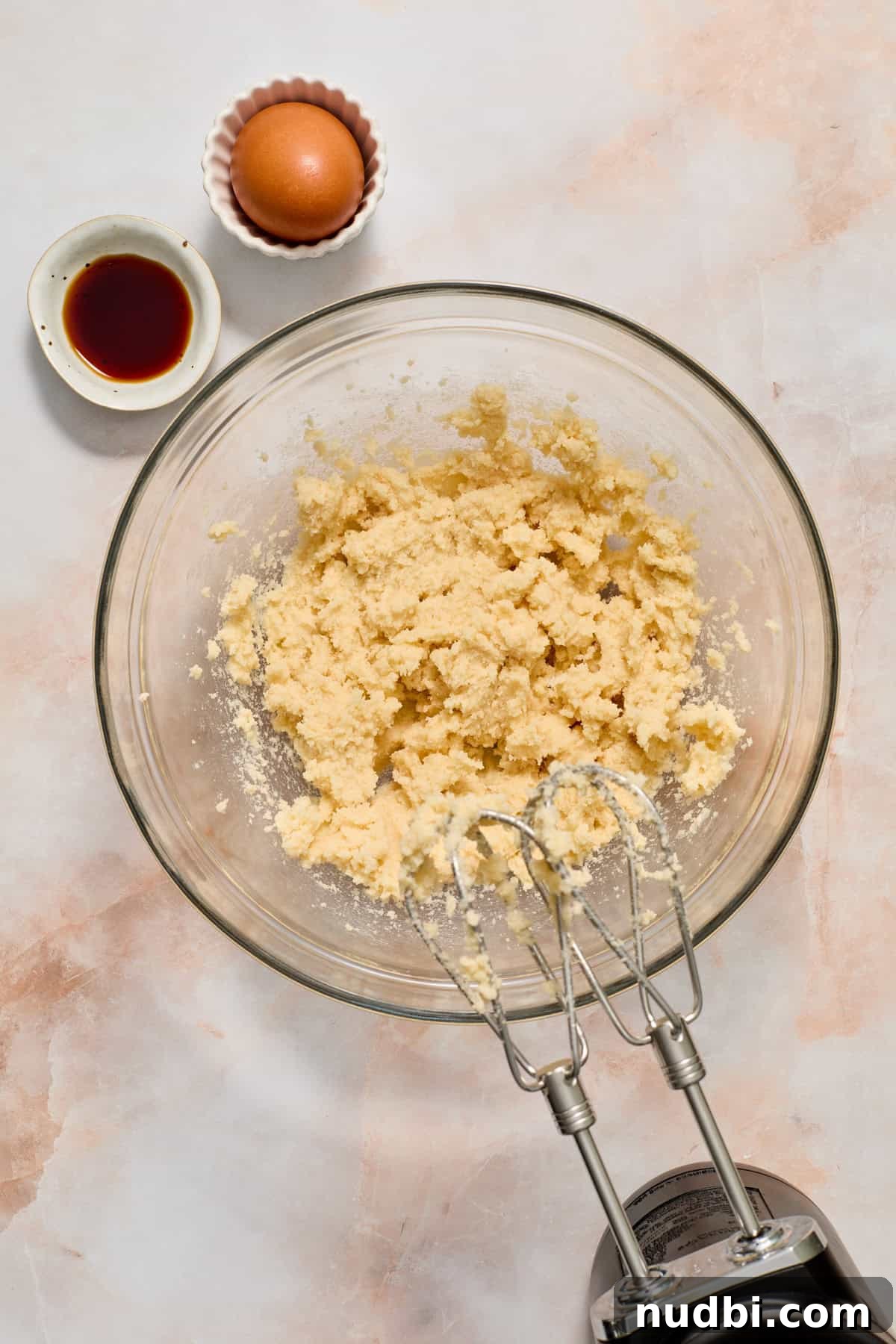 Zesty Key Lime Cookie Recipe for Luscious Citrus Cookies 4 Creamed butter and sugar in mixing bowl with hand mixer, vanilla and egg set to the side.