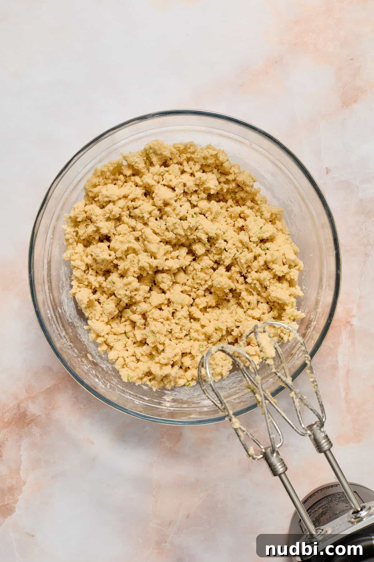 Zesty Key Lime Cookie Recipe for Luscious Citrus Cookies 7 Key lime cookie dough in glass bowl before pulling together.