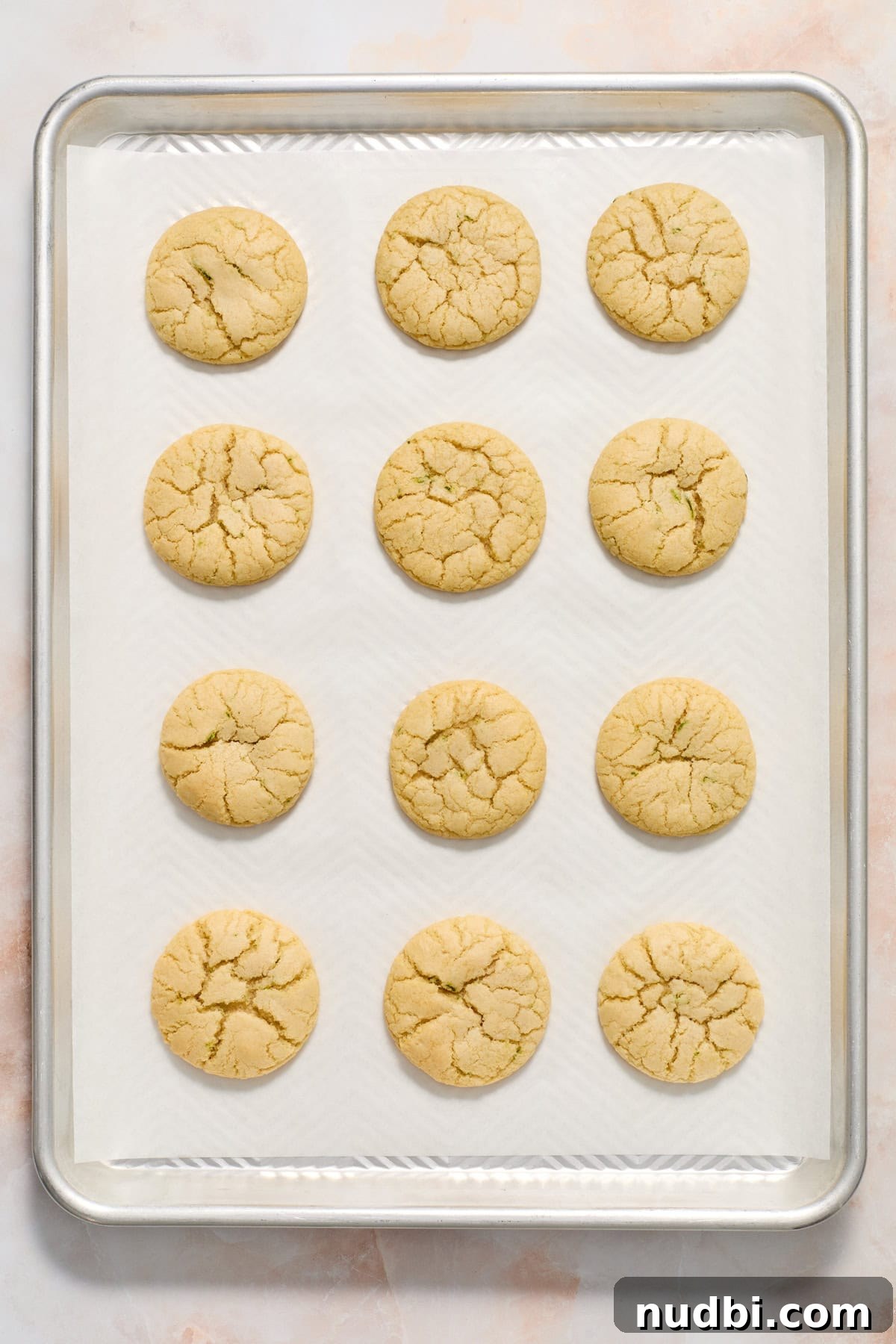 Zesty Key Lime Cookie Recipe for Luscious Citrus Cookies 9 Lime sugar cookies after baking on sheet pan.