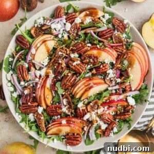 10 Delicious Side Dishes to Serve With Gnocchi 12 Apple and arugula salad in bowl with toasted maple pecans, goat cheese, dried figs and balsamic dressing.