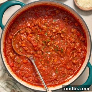 10 Delicious Side Dishes to Serve With Gnocchi 24 Ground turkey spaghetti sauce in pot with ladle.