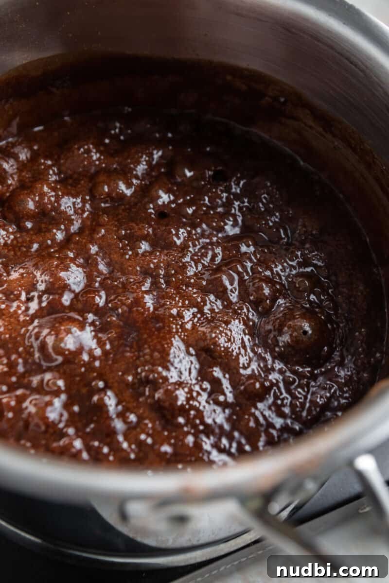 No-Bake Cookie Butter Sandwich Cookies 6 Boiling chocolate mixture in saucepan.