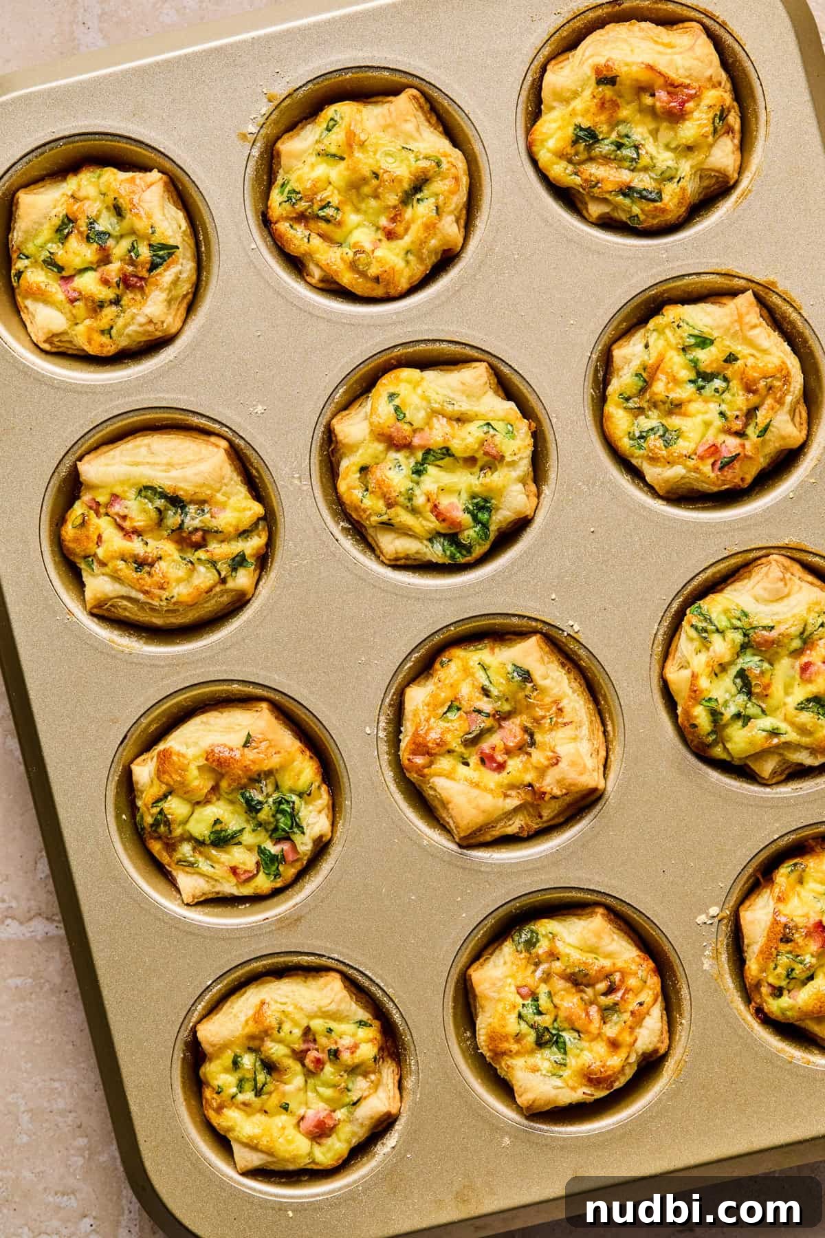 Flaky Puff Pastry Quiche Recipe: Quick Savory Tart for Brunch 10 Baked mini quiche in puff pastry.