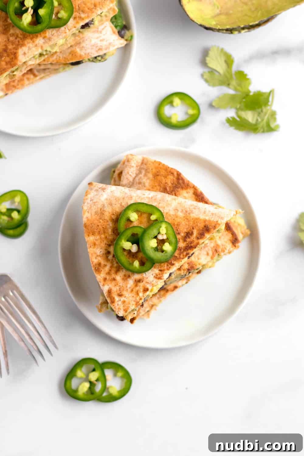 Vegan Black Bean and Avocado Quesadillas Recipe 3 Stacked vegan black bean quesadillas.