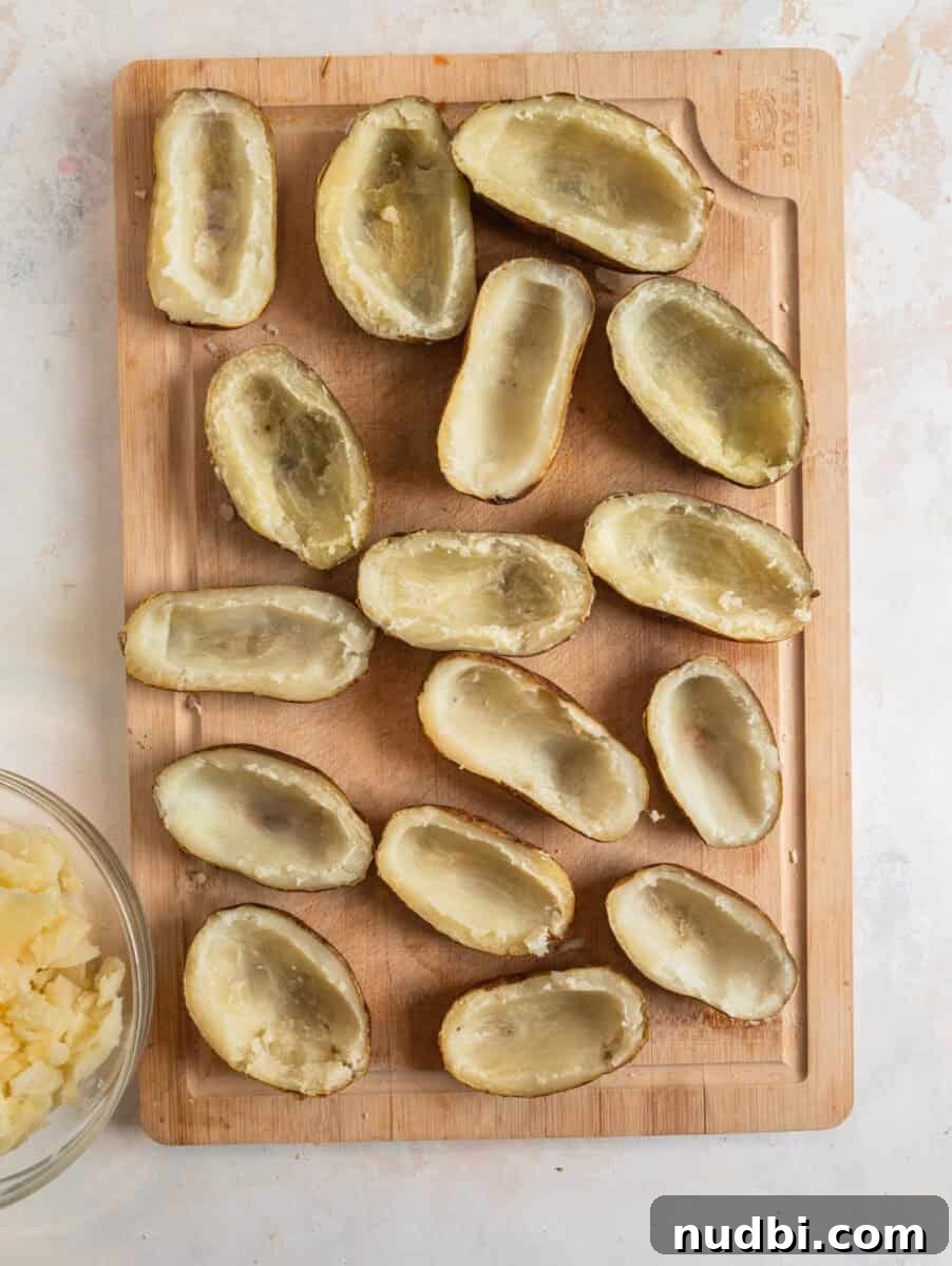 Cheeseburger-Stuffed Potato Skins: Loaded Appetizer Recipe 5 Potatoes with insides scooped out.