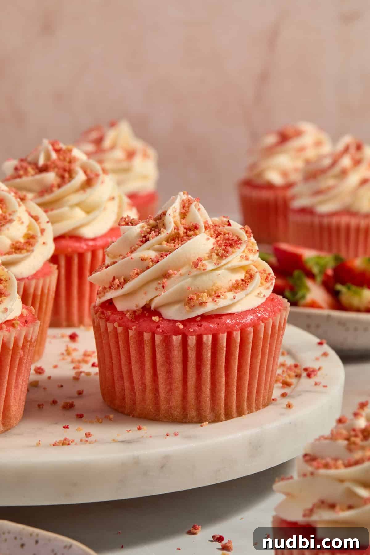 Strawberry Crunch Cupcakes with Crunchy Topping and Cream Cheese Frosting 12 Strawberry cupcakes topped with vanilla piped buttercream and strawberry shortcake crunch topping.