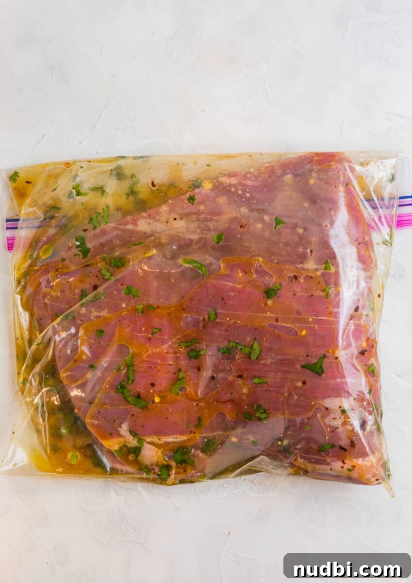 Grilled Flank Steak Salad with Chimichurri and Arugula 6 Steak in plastic bag with marinade.