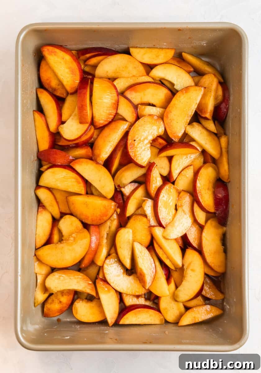 Peach Cobbler Made with Cake Mix: Quick Southern Dessert recipe 6 Peaches in baking pan.