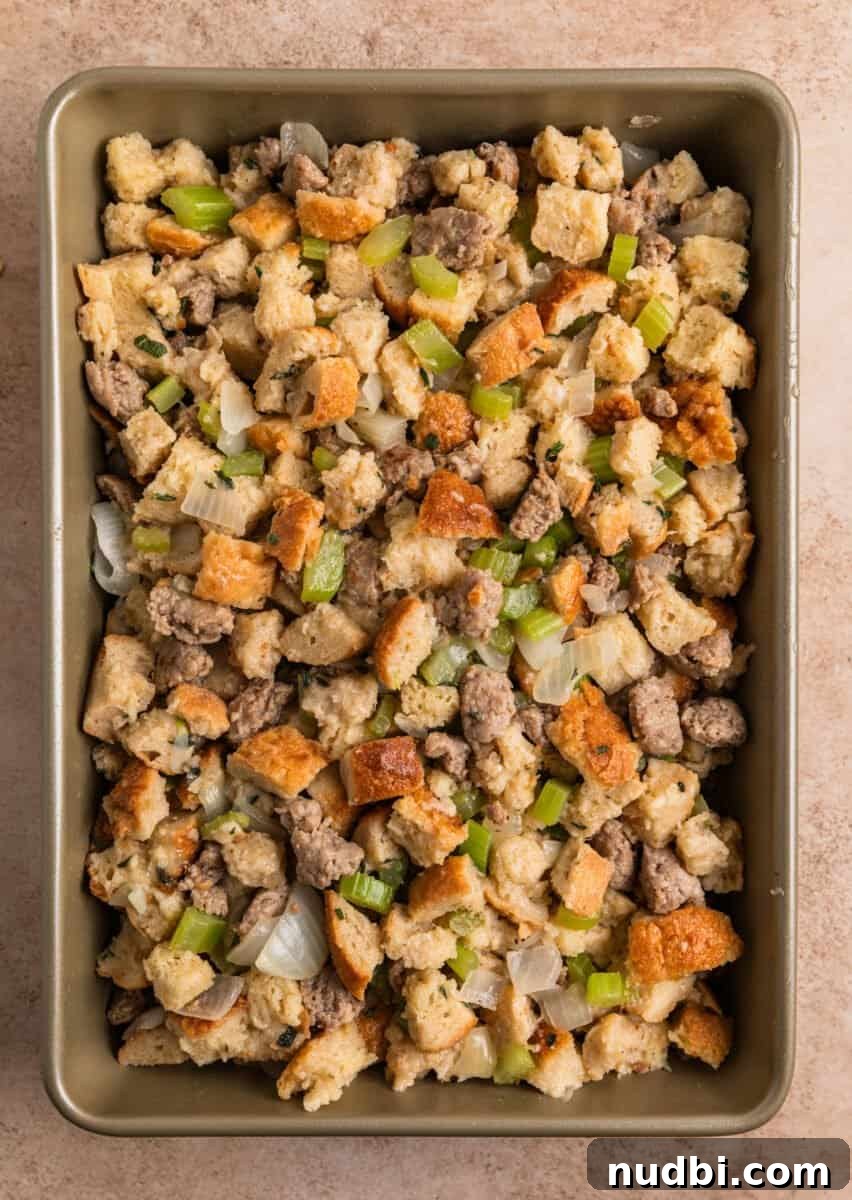 Turkey Sausage Stuffing Recipe for Thanksgiving and Holiday Meals 14 Turkey sausage stuffing in baking pan before baking.