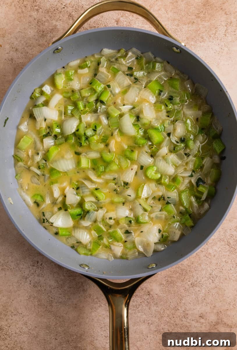 Turkey Sausage Stuffing Recipe for Thanksgiving and Holiday Meals 10 Skillet with butter, onion, celery and herb mixture.