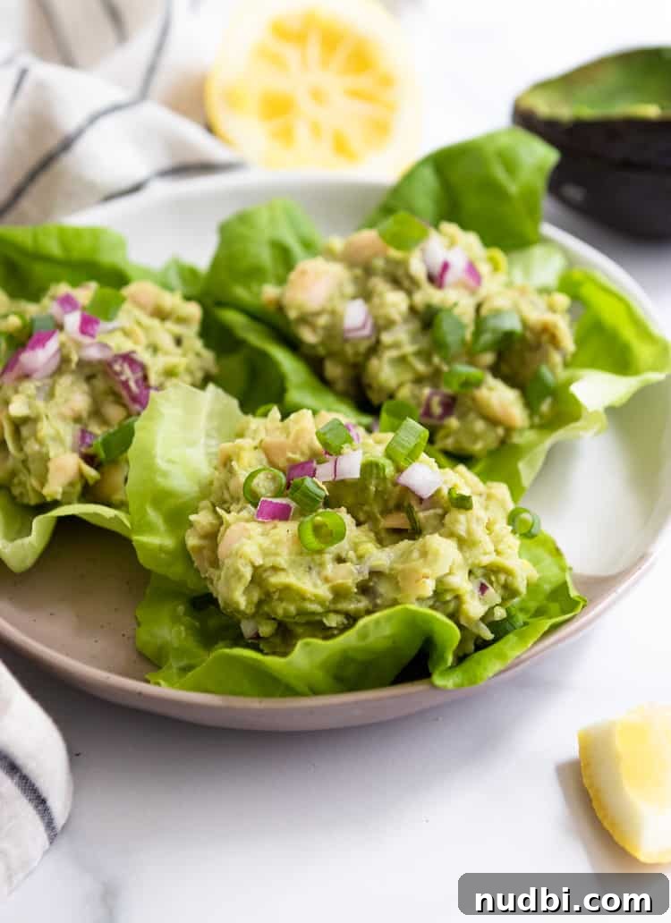 Creamy Avocado and White Bean Lettuce Wraps for Quick Lunch 4 Vegetarian Lettuce Wraps: Mashed Avocado + White Bean Lettuce Wraps.